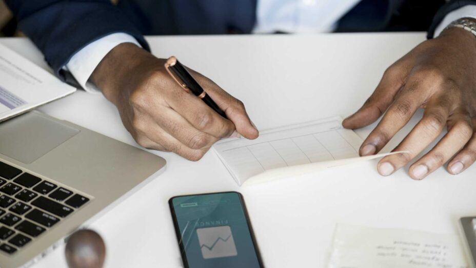 businessman signing paper work