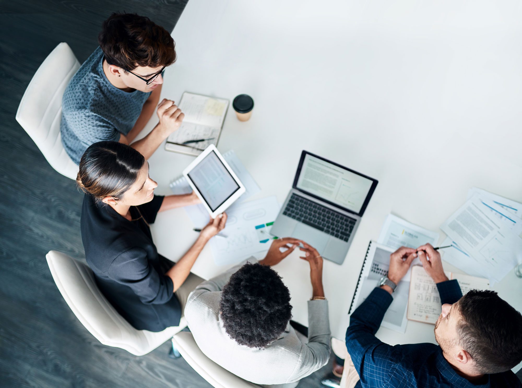 overhead view of coworkers collaborating