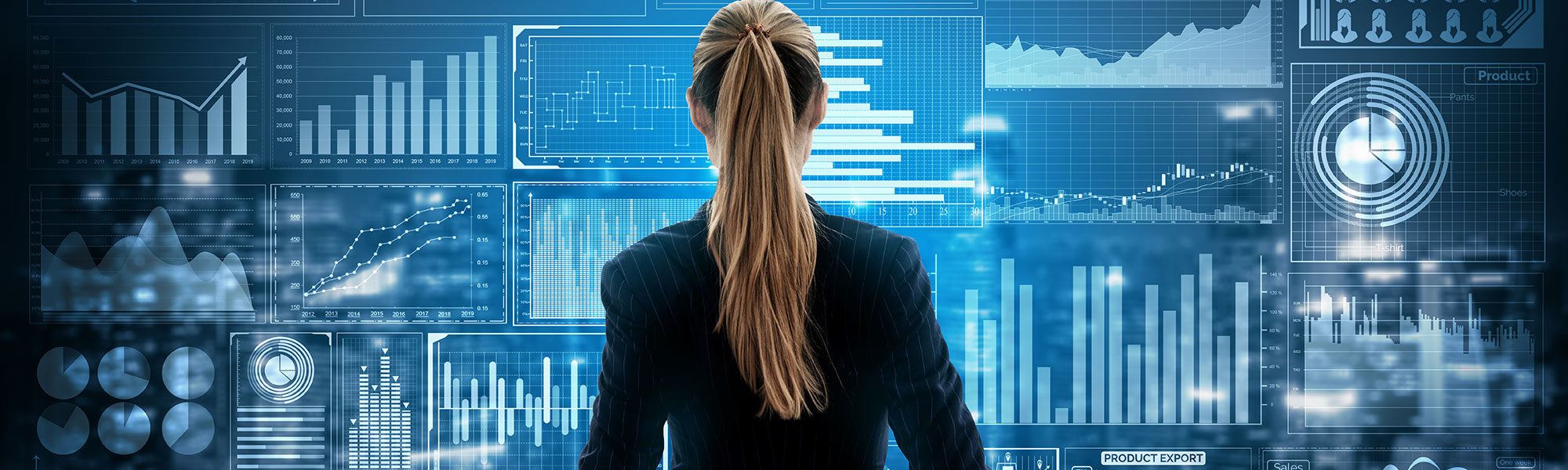 Woman looking at large data screen, big data