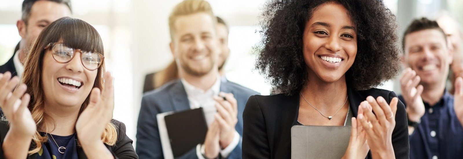 inspired employees clapping