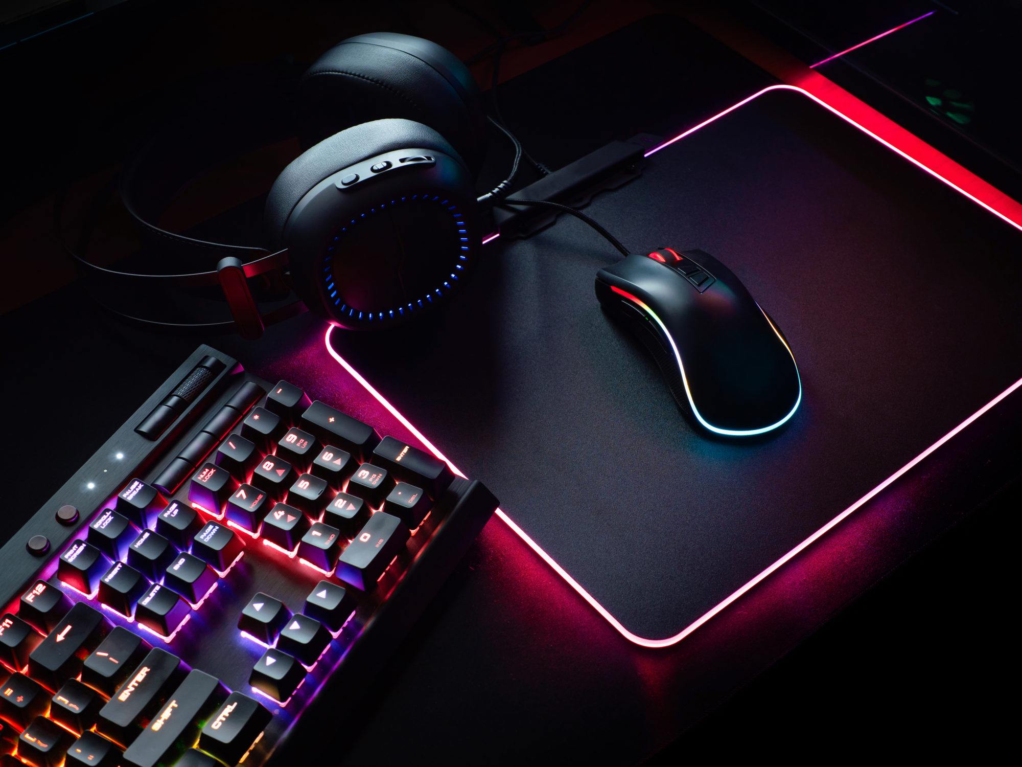 overhead view of gaming mouse, keyboard with RGB Colour, joystick, headset, webcam, Virtual Reality Headset