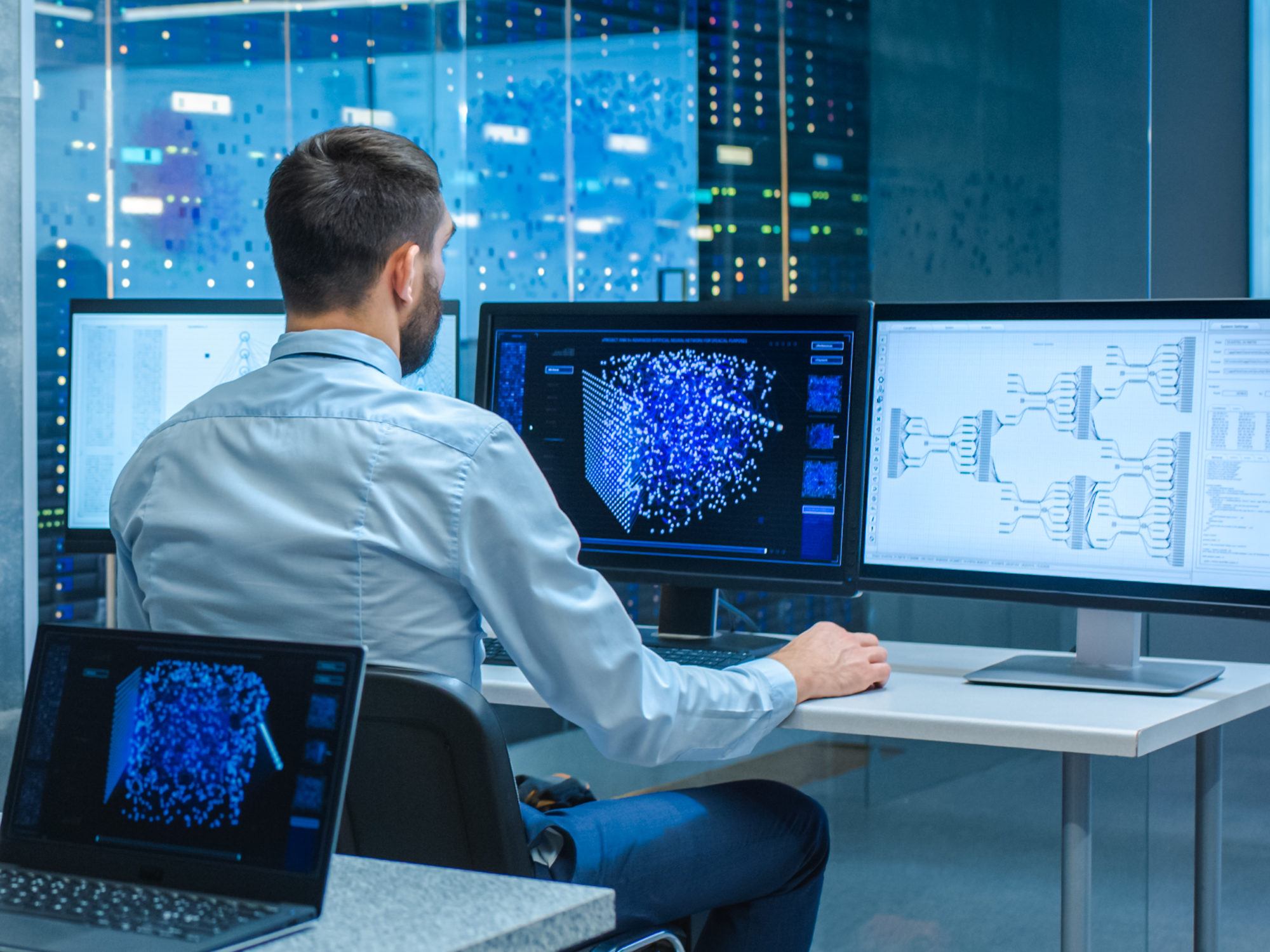 Male sitting at computer working